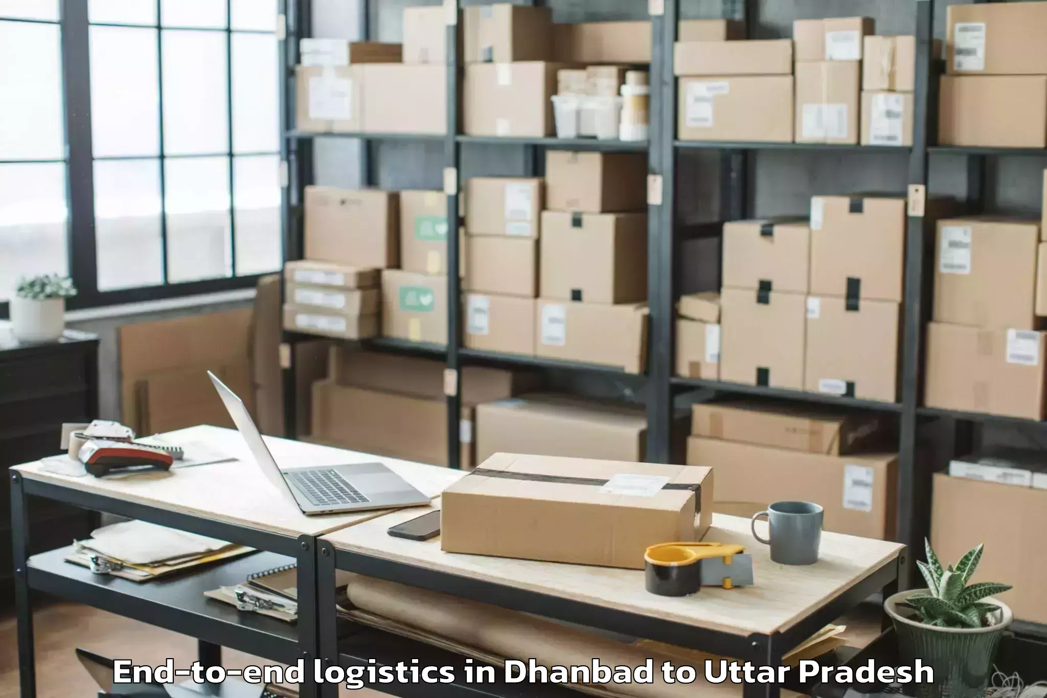 Top Dhanbad to Mauranwan End To End Logistics Available